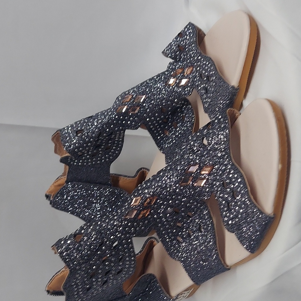 NWOB. Women's silver sparkly sandals. Zippered back.